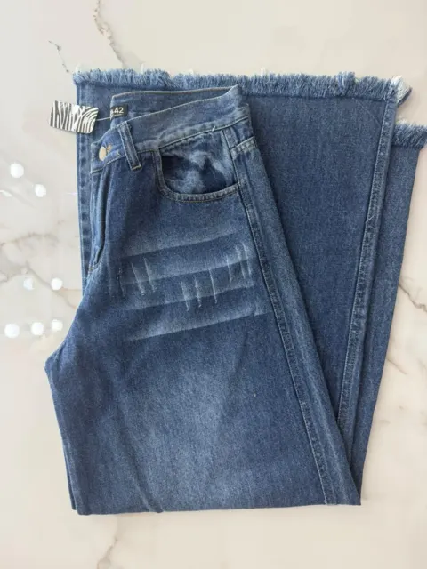 Remera + Jeans talle 42 suelto